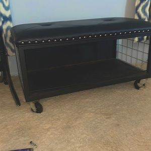 Black leather rolling storage cushion seat